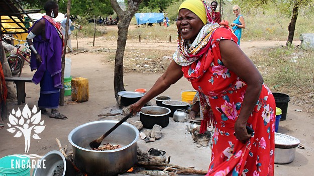 woman cooking on market day